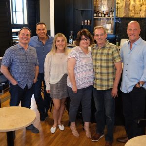Photo of the VNN Executive Team and WPA Network Co-Owners at VNN's Minneapolis Office
